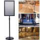 Aluminum floor-standing display stand for posters and advertisements, available in A4 and A3 sizes, in black, silver, and gold.